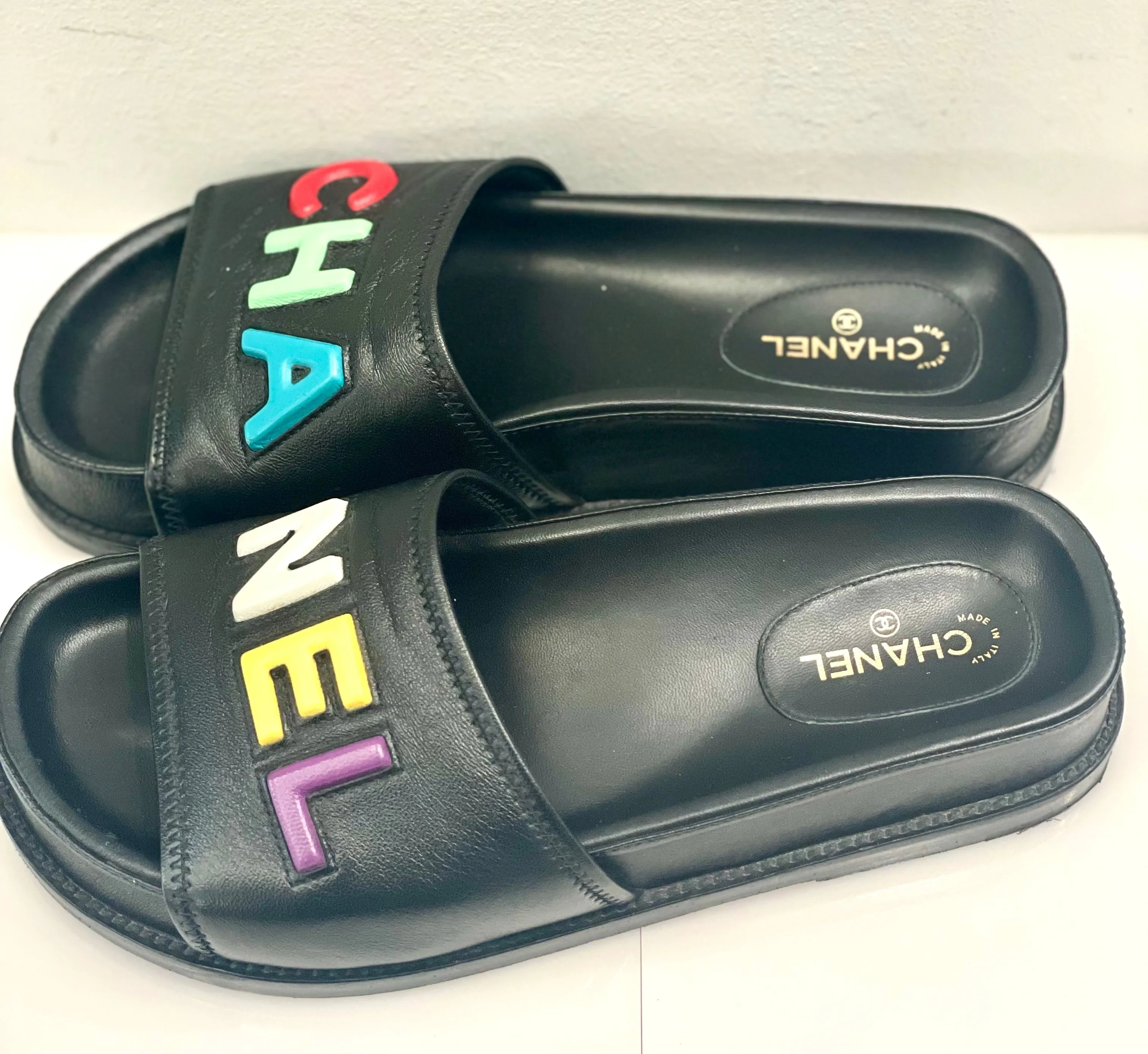 CHANEL LAMBSKIN CHA-NEL SANDLAS MULES