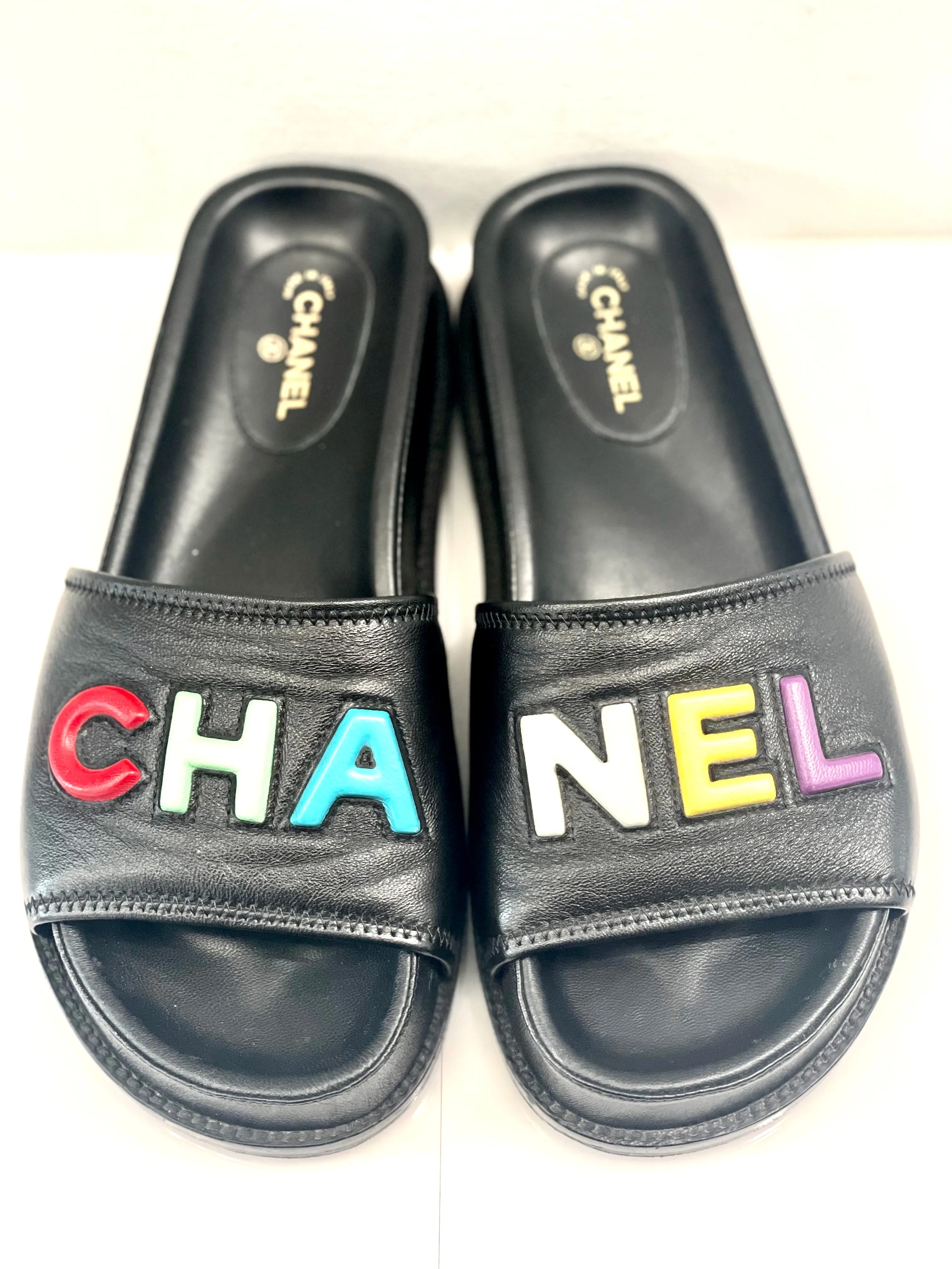 CHANEL LAMBSKIN CHA-NEL SANDLAS MULES