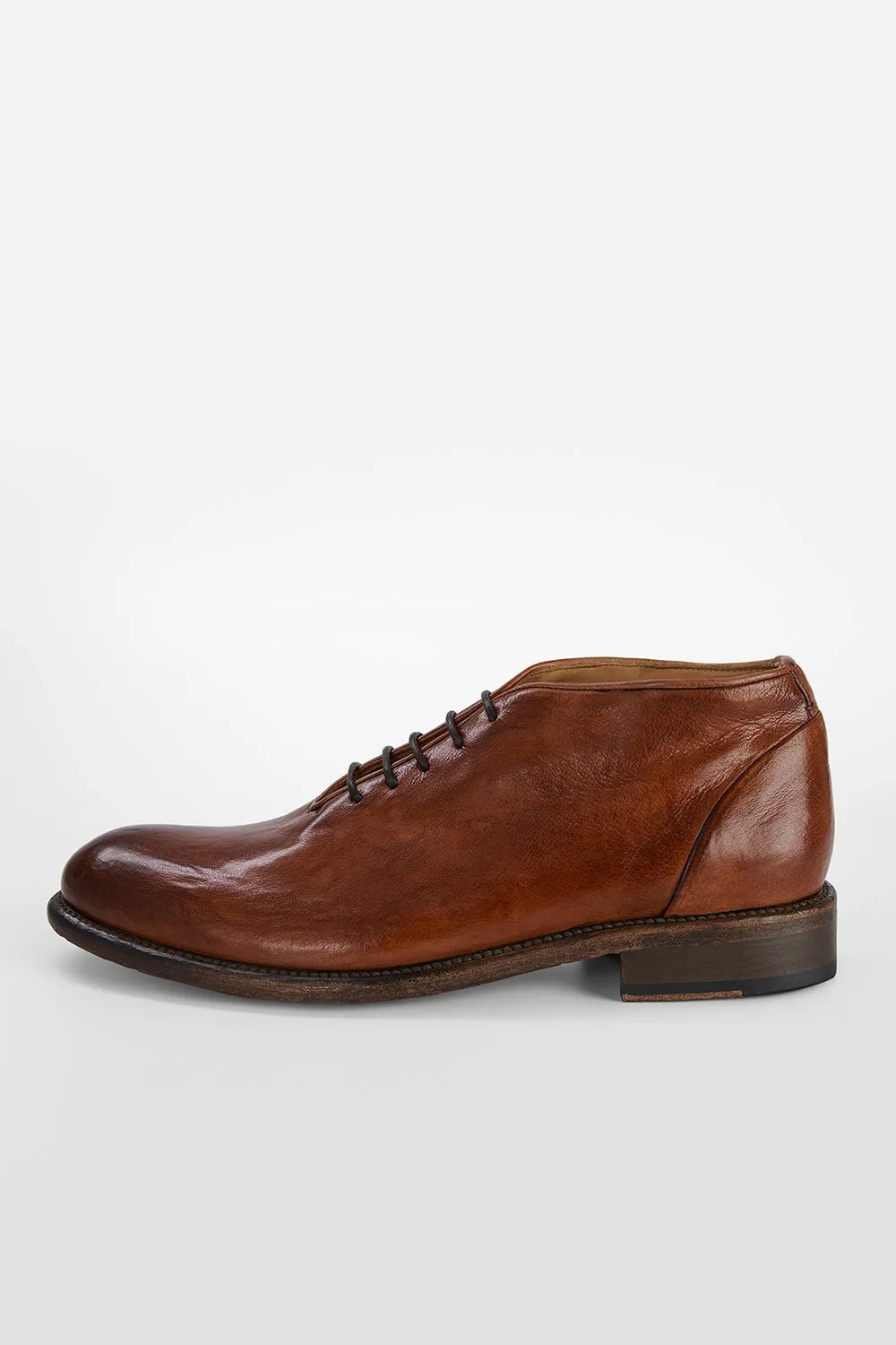 KNIGHTON rich-cognac wholecut chukka boots.