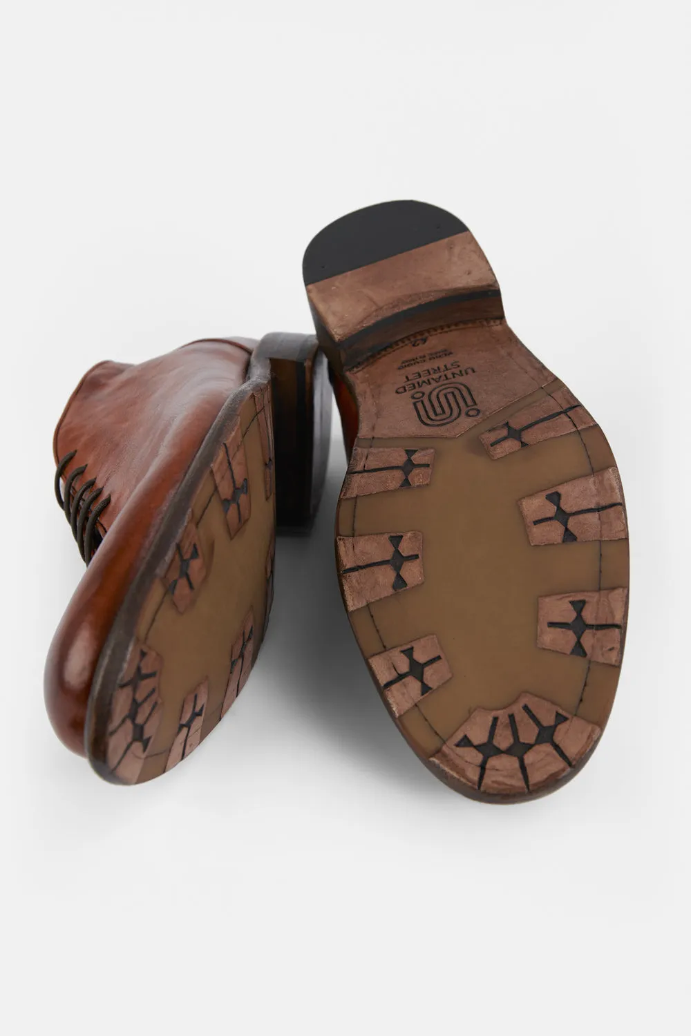 KNIGHTON rich-cognac wholecut chukka boots.
