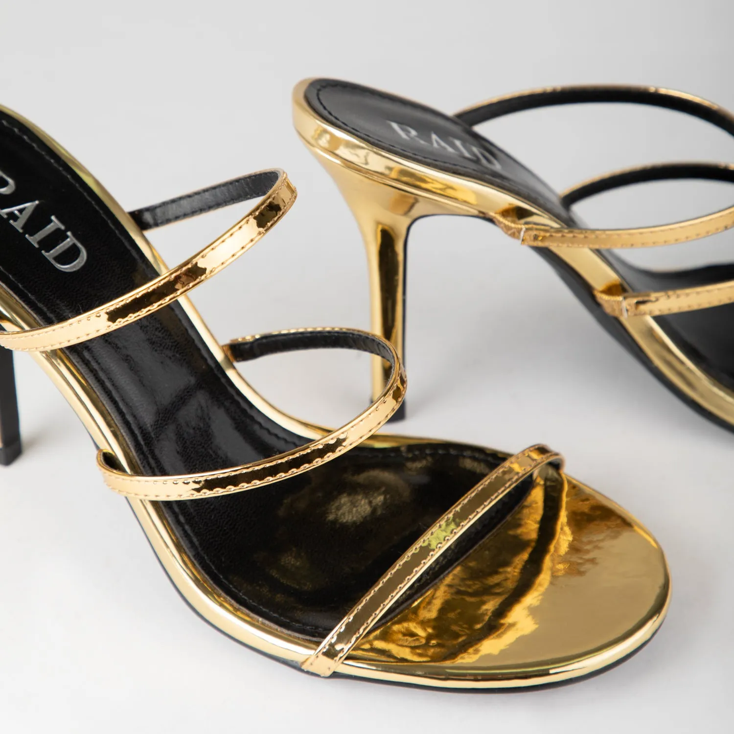 RAID Lareina Heeled Mules in Gold